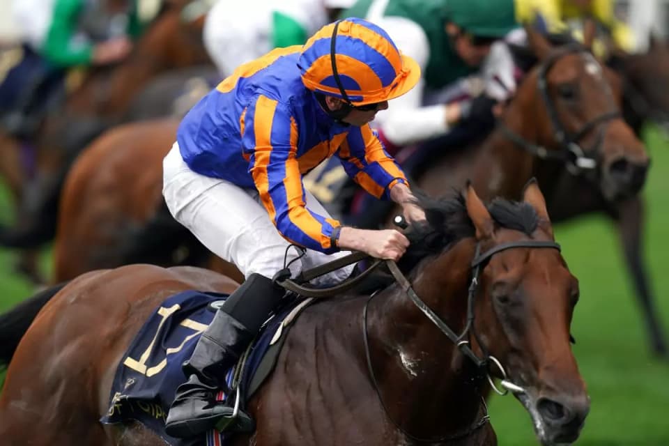 River Tiber ridden by jockey Ryan Moore on their way to winning the Coventry Stakes at Royal Ascot 2023