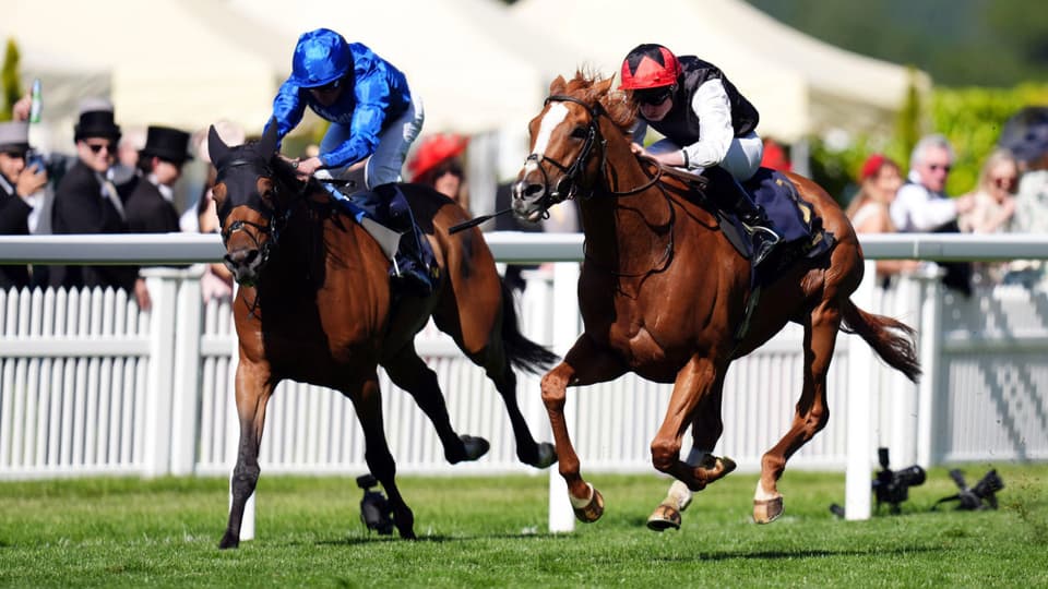 Kyprios ridden by Ryan Moore (right) on their way to winning the Gold Cup